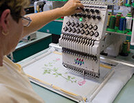 Embroidery machine for personalized casket features