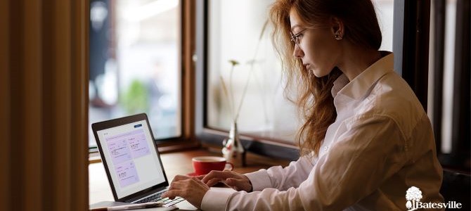 woman using AI assistant on computer