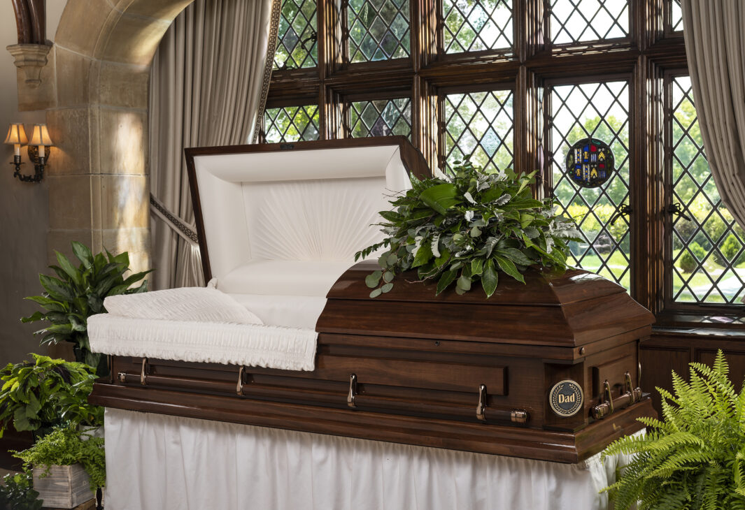 wood casket personalized with dad emblem