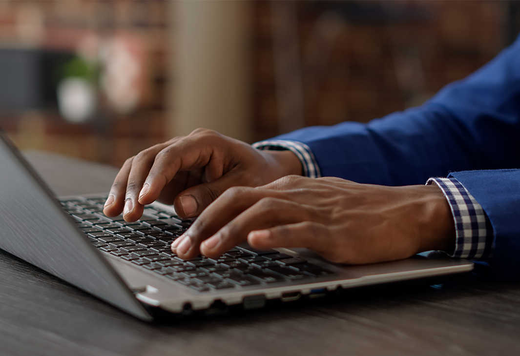 hands on a keyboard technology image